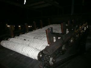 Coke grill separator with wear resistant ceramics shafts